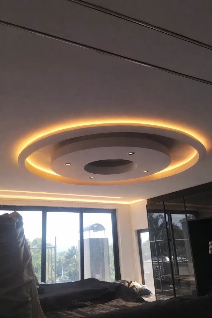 A round recess lit from inside, so the fitting disappears and only the glow shows.